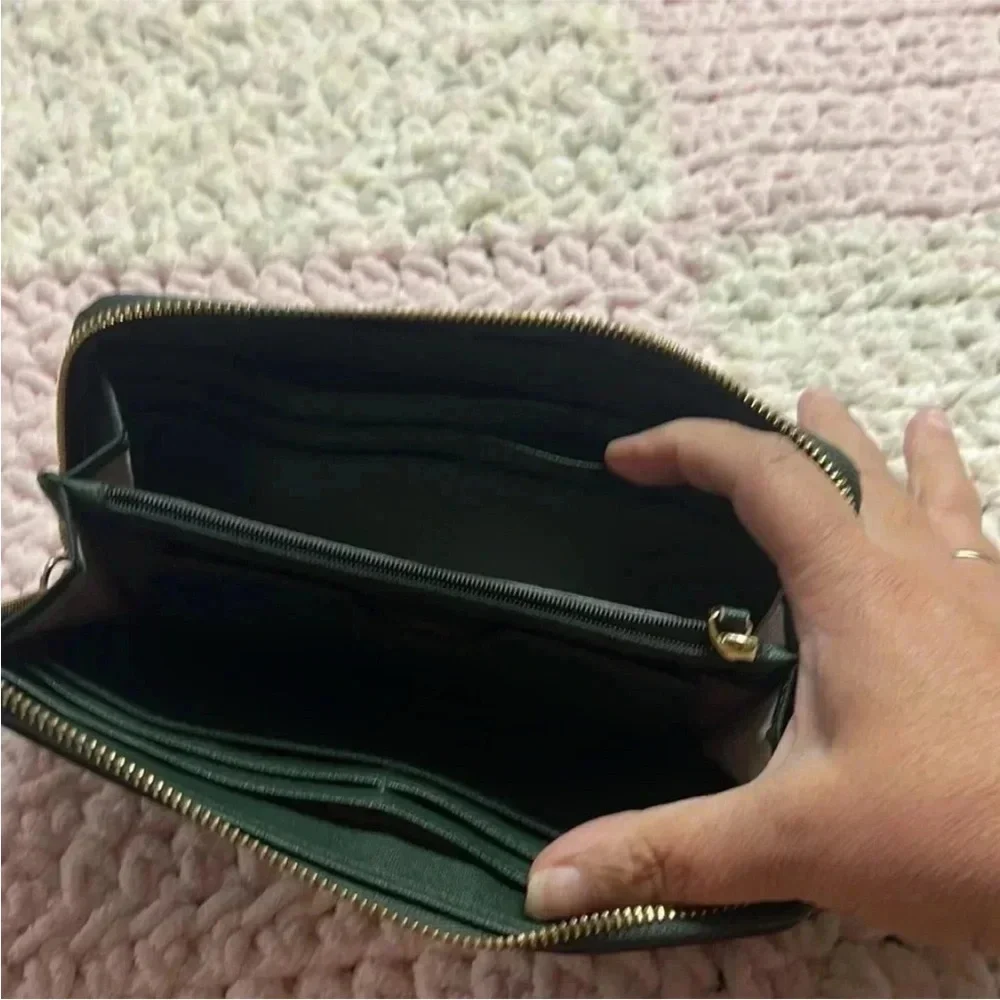- Michael Kors green large wallet